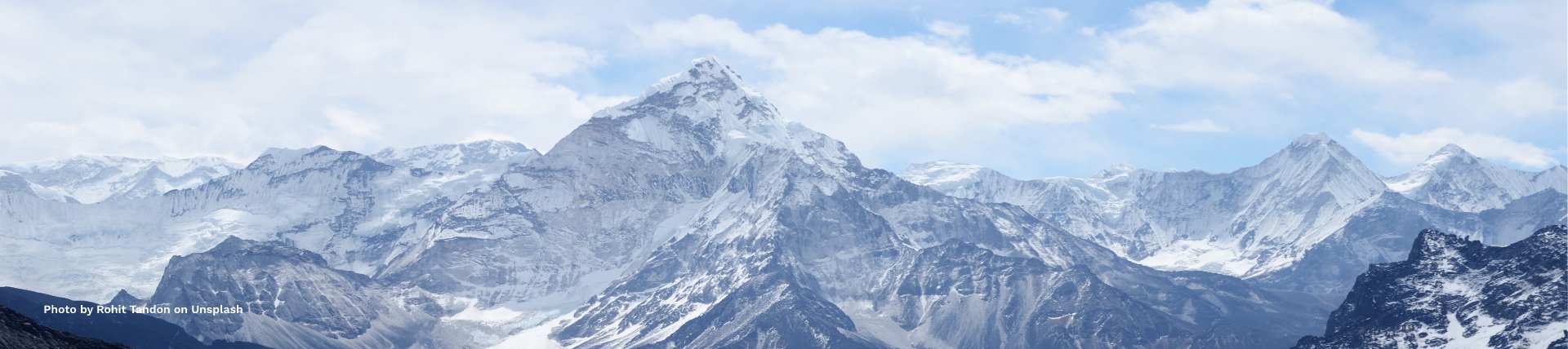 Photo of a snowy mountain range